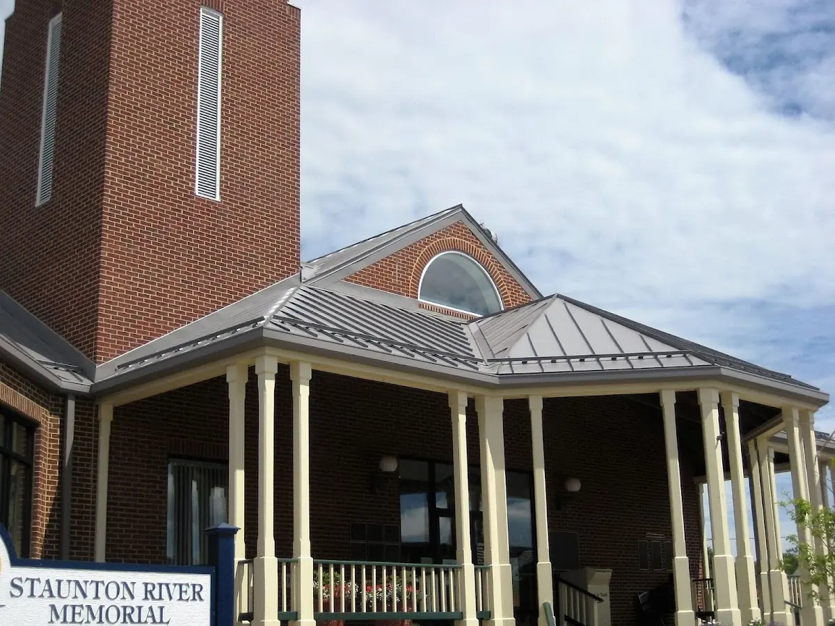 Skilled roofing craftsmen working on a residential roof in Ferndale